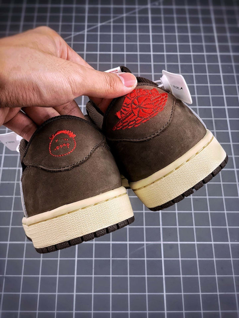 Tênis Nike Air Jordan 1 Low Travis Scott